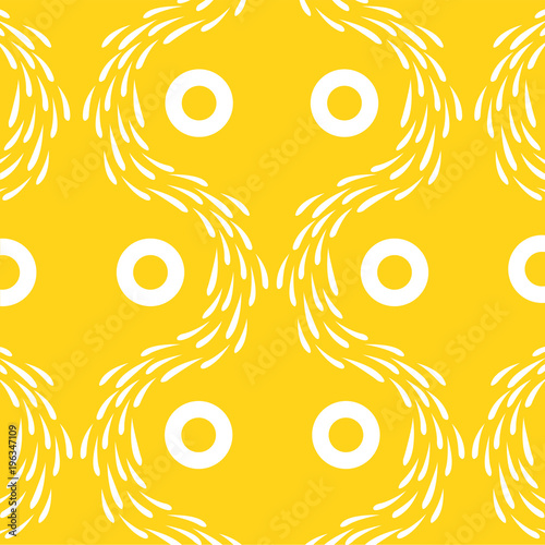 Yellow wallpaper with white pattern