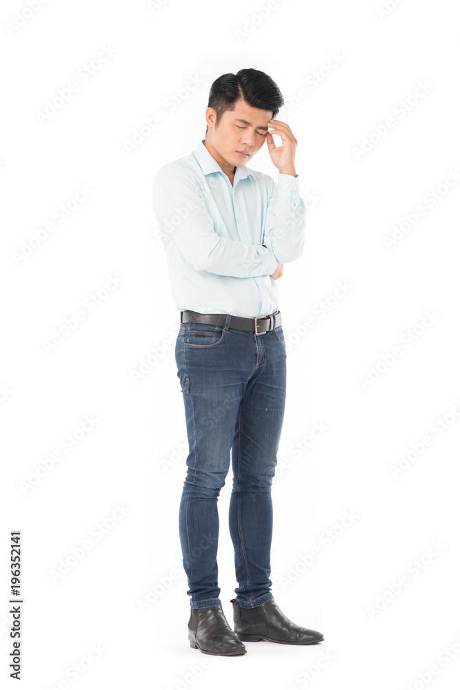 Studio portrait of young Asian man expressing emotions on white background Studio portrait of young Asian man expressing emotions on white background