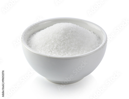 white sugar in white bowl on white background