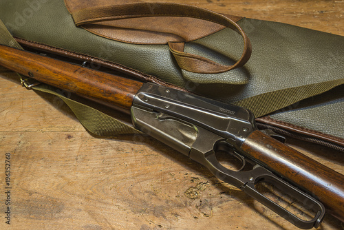 Hunting carbine with leather sheath