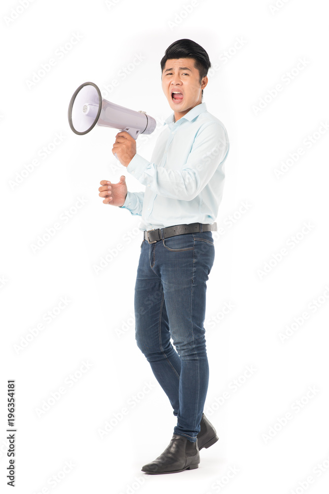 Excited Asian man speaking through megaphone isolated on white Excited Asian man speaking through megaphone isolated on white