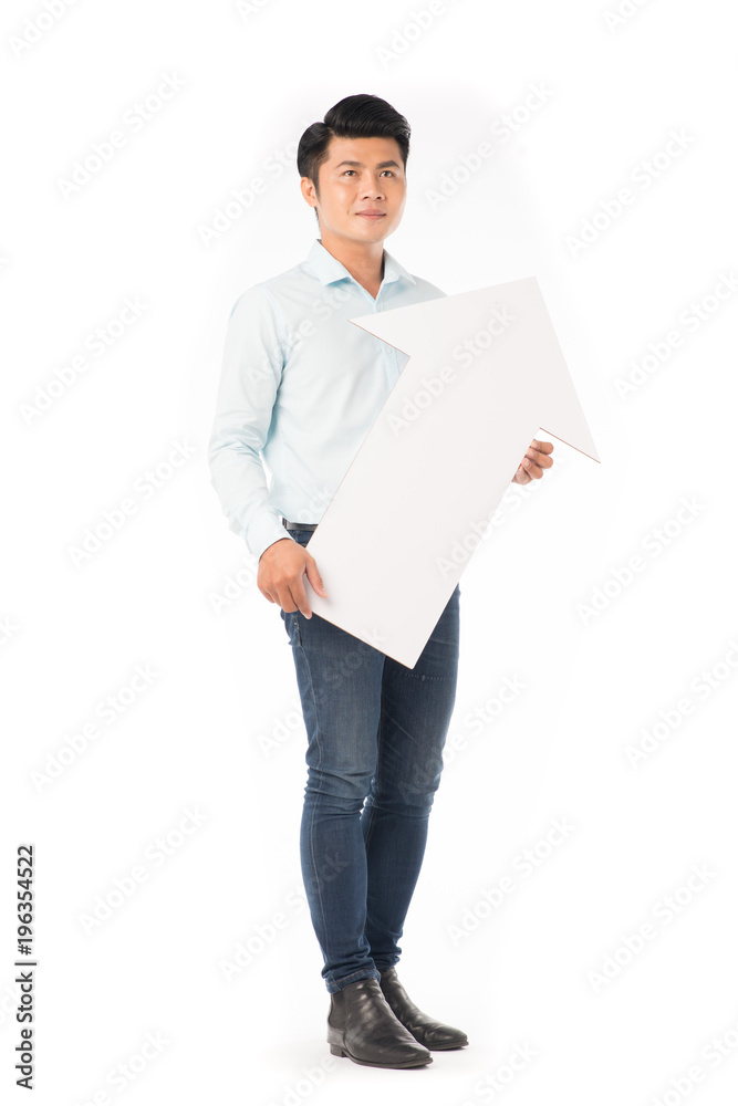 Young Asian man holding white paper array sign Young Asian man holding white paper array sign