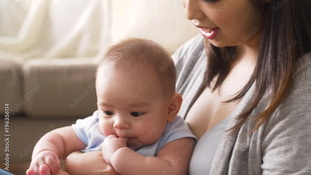 happy young mother with little baby at home happy young mother with little baby at home