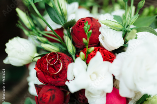 Wedding bouquet with roses and other flowers photo