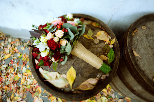 Wedding bouquet with roses and other flowers photo