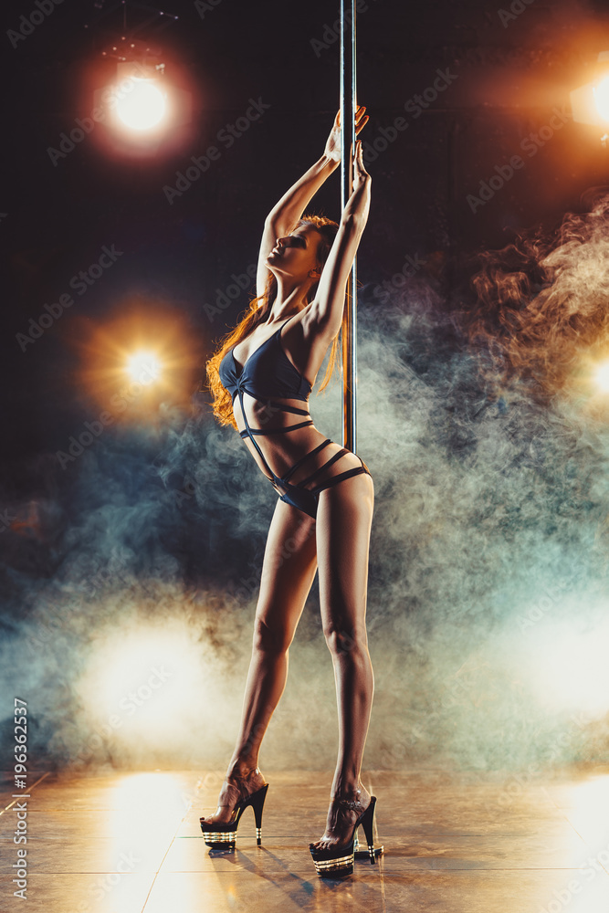 Pole dancing woman