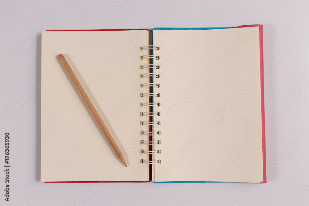 notebook with brown pencil, office concept top view