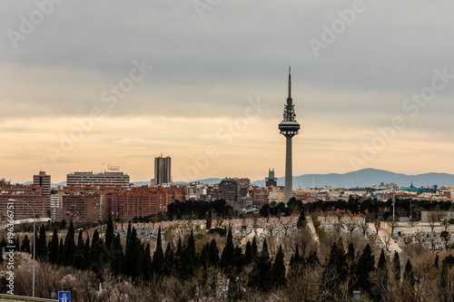 Skyline of Madrid with the communications tower called El Piruli in the foreground.