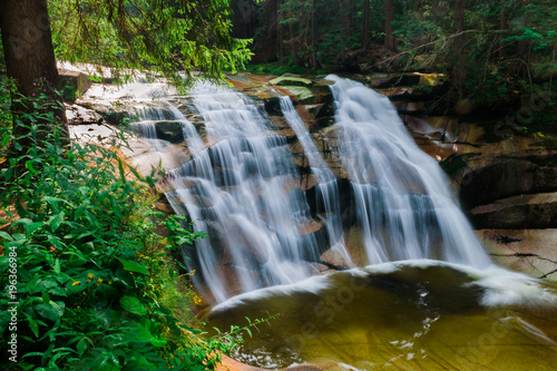 Fototapeta Naklejka Na Ścianę i Meble -  Waterfall on the creek Mumlava near the town Harrachov in Czech Republic
