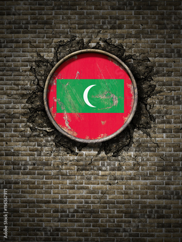 Old Maldives flag in brick wall