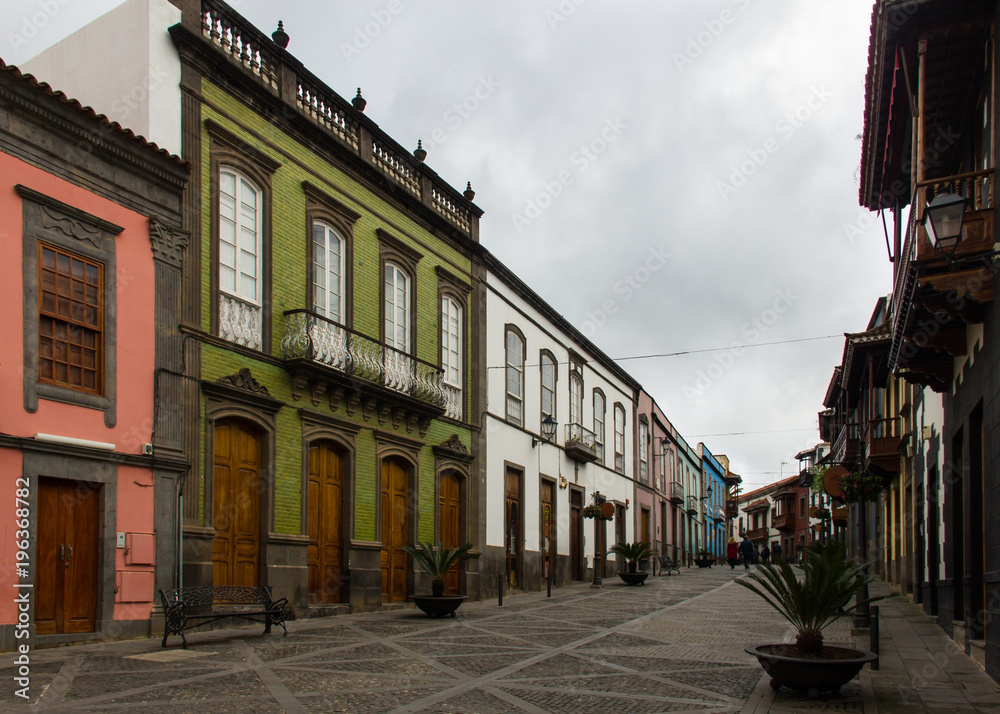 Empty street with traditional architecture and colorful building facades in Teror old town, Gran Canaria. Tourist destination in Canary Islands, Spain