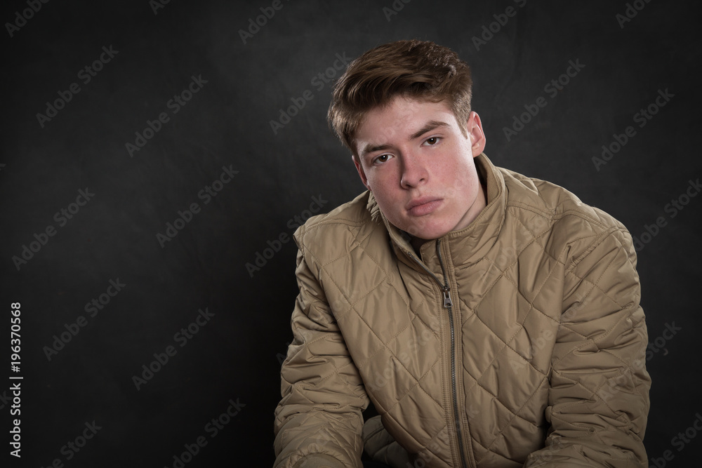 Fototapeta premium Serious teenage boy