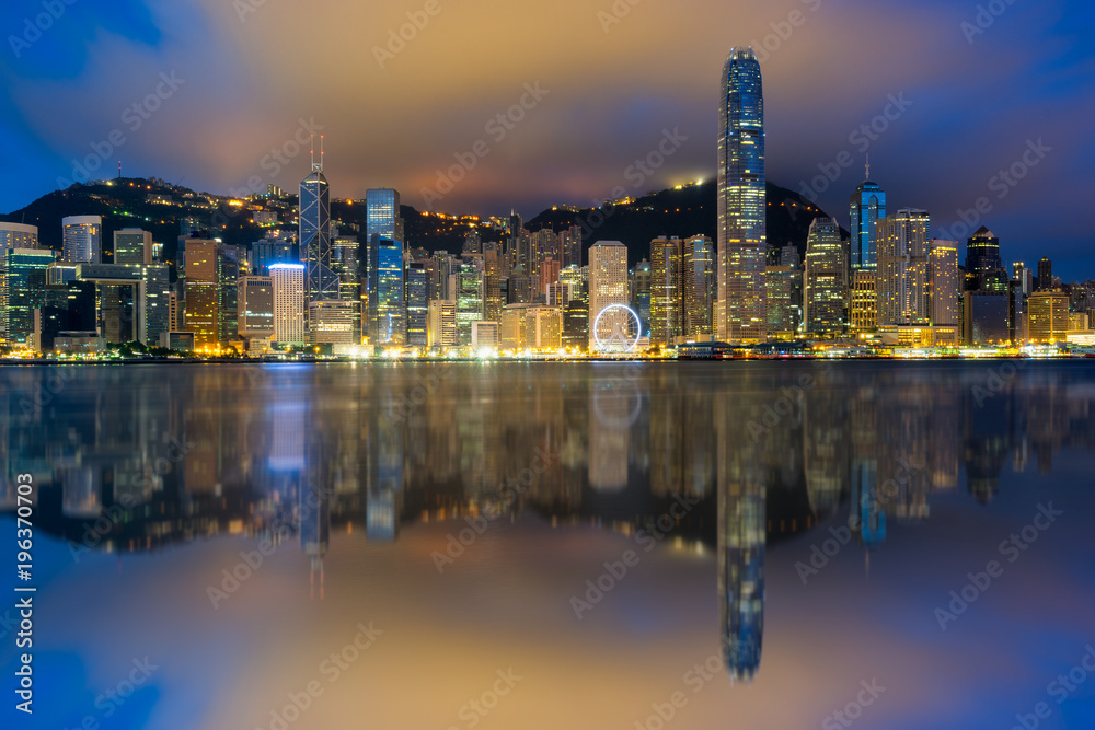 Hong Kong City skyline at sunrise. View from across Victoria Harbor Hongkong.