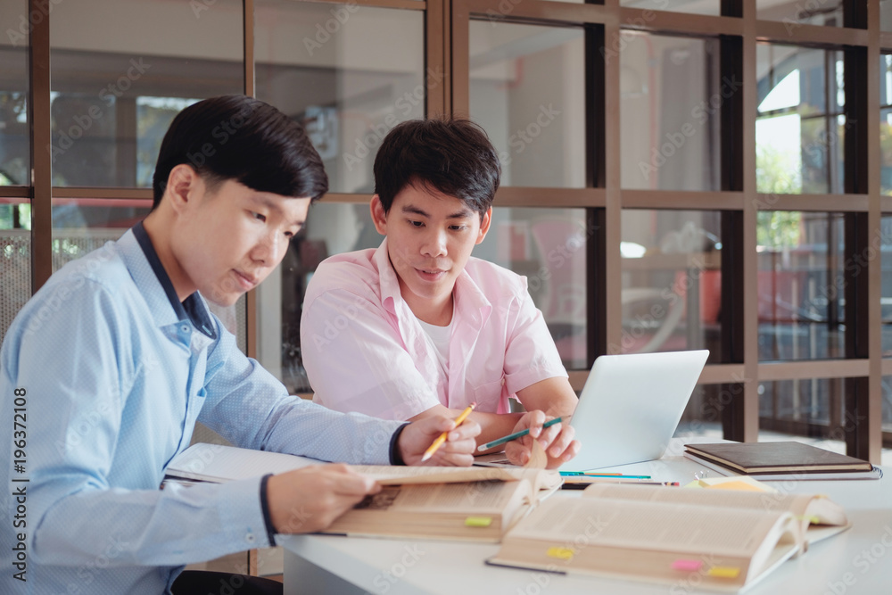 Young students campus helps friend catching up and learning. Young students campus helps friend catching up and learning.