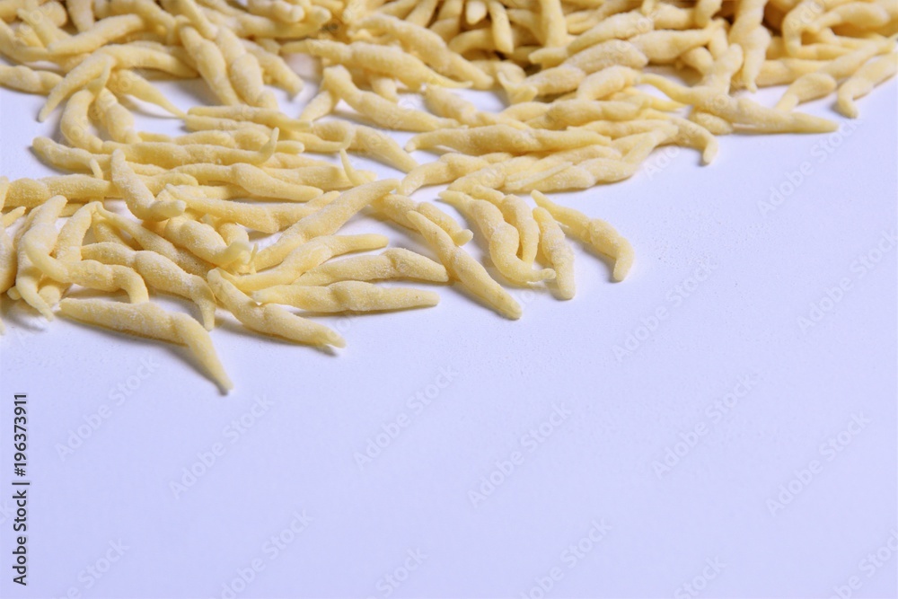 Fresh homemade pasta Italian trophy on a light background Fresh homemade pasta Italian trophy on a light background