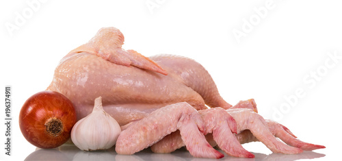 Whole Chicken carcass and wings, onion garlic, isolated on white