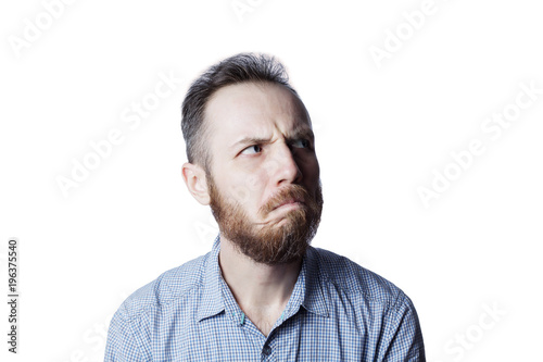 Face of an pensive and insult male on a white background.