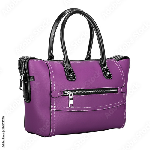 Fashionable purple classic women's handbag of solid leather with embossed stripes and big zipper three quarters view isolated on white background