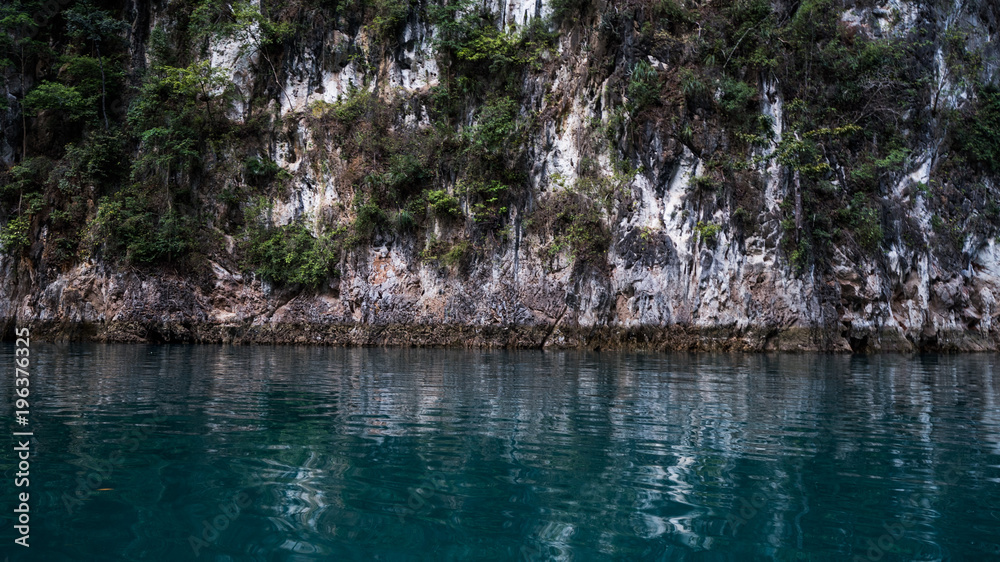 Beautiful view mountain lake and river from boat in Ratchaprapa dam, Khoa Sok National Park, Surat Thani, Thailand Beautiful view mountain lake and river from boat in Ratchaprapa dam, Khoa Sok National Park, Surat Thani, Thailand