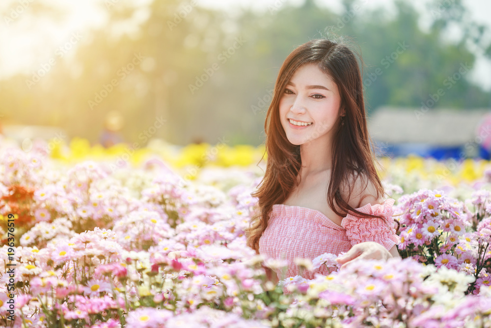 beautiful woman in chrysanthemum glower garden beautiful woman in chrysanthemum glower garden