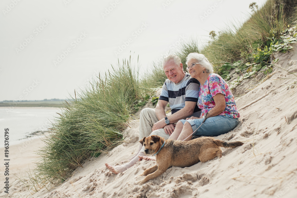 Fototapeta premium Couple Relaxing on the Beach