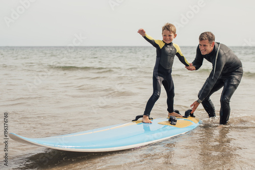 Surfing with Dad at the Beach