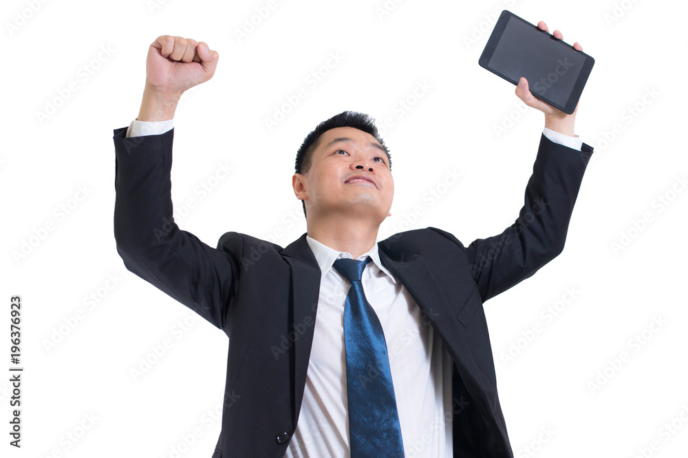 Modern asian businessman hand holding digital tablet celebrating successful. Businessman happy and smile with Arms up while standing isolated on white background. Using as business success concept. Modern asian businessman hand holding digital tablet celebrating successful. Businessman happy and smile with Arms up while standing isolated on white background. Using as business success concept.