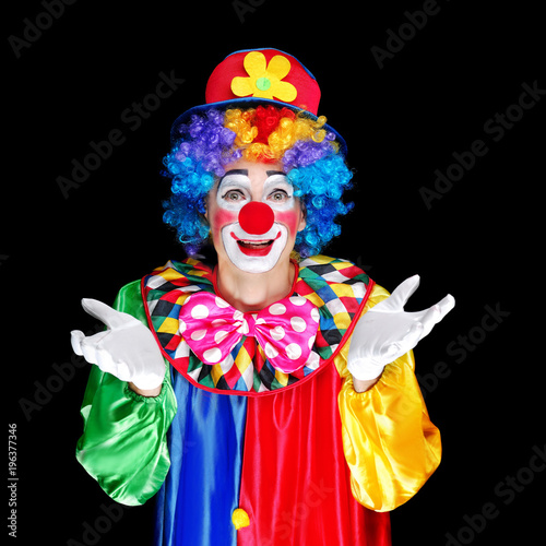 Clown over black background closeup portrait
