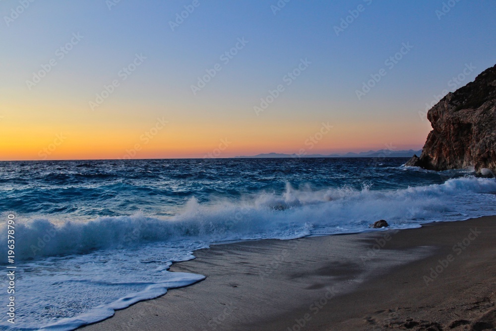Sunset over Milos Beach