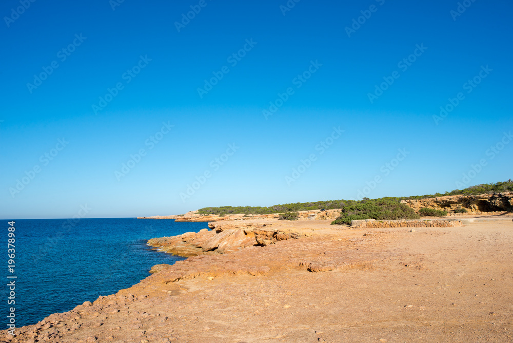 Transparent waters in the cala compte, Ibiza Transparent waters in the cala compte, Ibiza