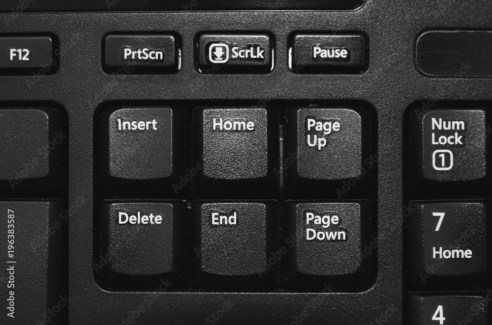 Close up on the Insert, Home, Page up, Delete, End, Page down buttons from  a black pc keyboard Photos | Adobe Stock