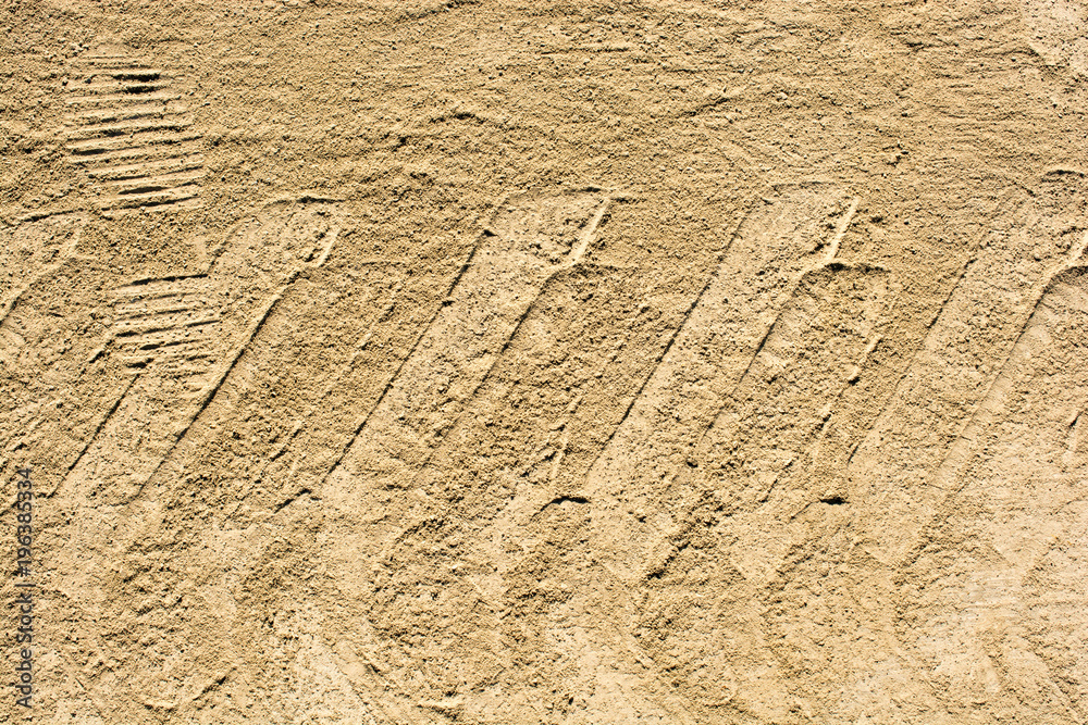 Tire tracks tire marks on Concrete as abstract texture Tire tracks tire marks on Concrete as abstract texture