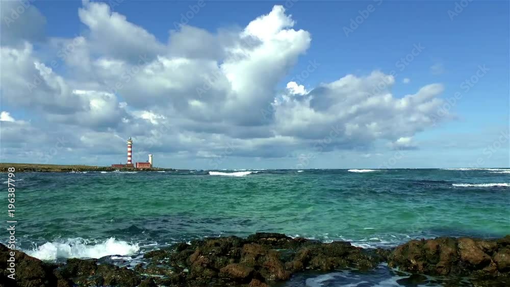 The lighthouse Faro del Tostón near El Cotillo Fuerteventura Canary Islands. The lighthouse Faro del Tostón near El Cotillo Fuerteventura Canary Islands.