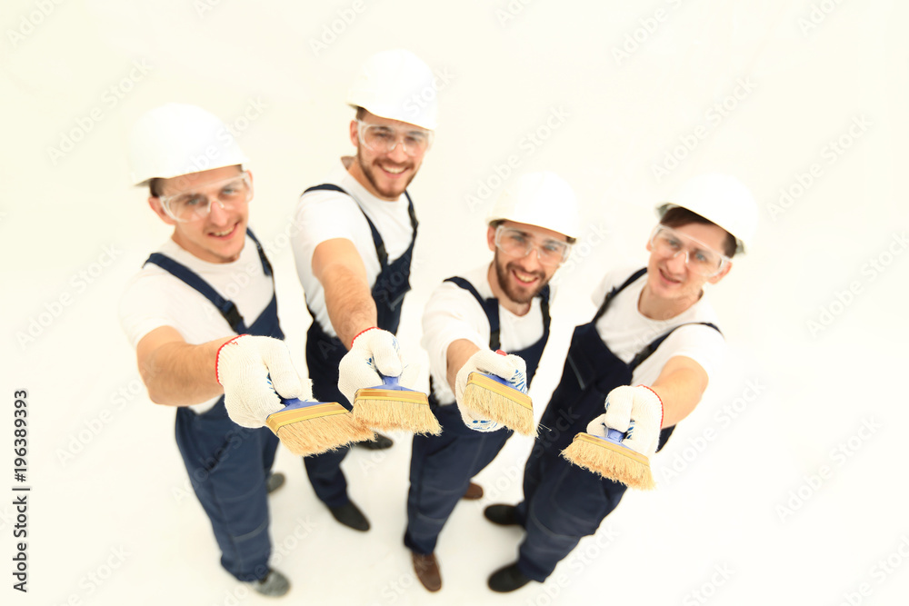 team of construction workers looking at the camera team of construction workers looking at the camera