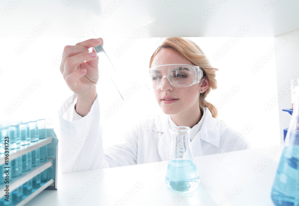closeup.portrait of doctor biologist in the lab. closeup.portrait of doctor biologist in the lab.