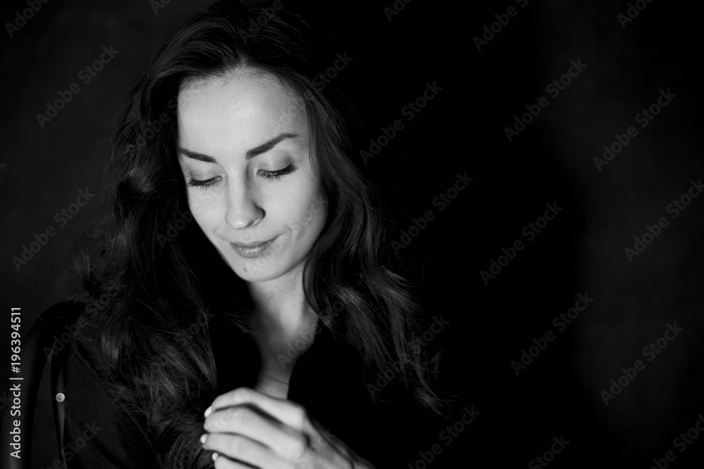 Black and white Portrait of beautiful young smiling tender woman. People concept. Black and white Portrait of beautiful young smiling tender woman. People concept.