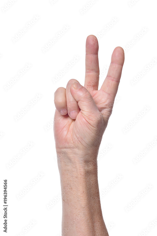 Hand of senior woman showing two fingers Hand of senior woman showing two fingers