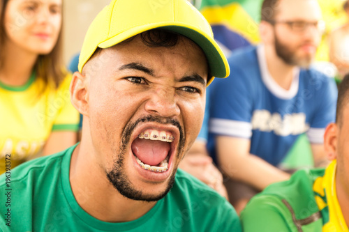 фотографія Brazilian supporters at stadium bleachers.