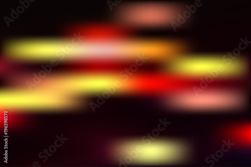 Bright colored blurry spots on a black background.