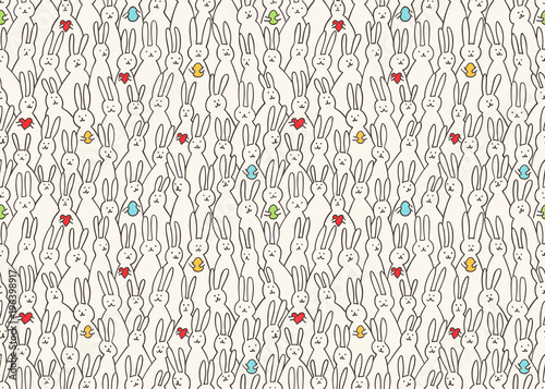 Funny bunny seamless pattern. Illustration of cute easter bunnies with easter eggs and hearts. Bright easter background for textile, fabric, covers, scrapbooking, wallpapers, print, gift wrapping.