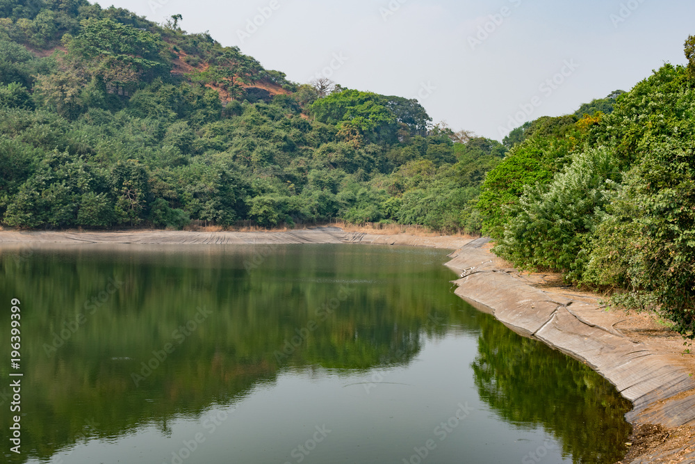 artificial lake near of two mountain.