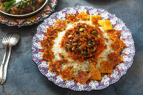 Jeweled rice or shirin polo in traditional plate photo