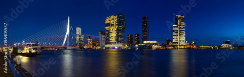 Fotografie City Landscape, panorama - Night view on Erasmus Bridge and district Feijenoord city of Rotterdam, The Netherlands