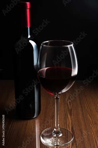 Bottle and Glass of Red Wine