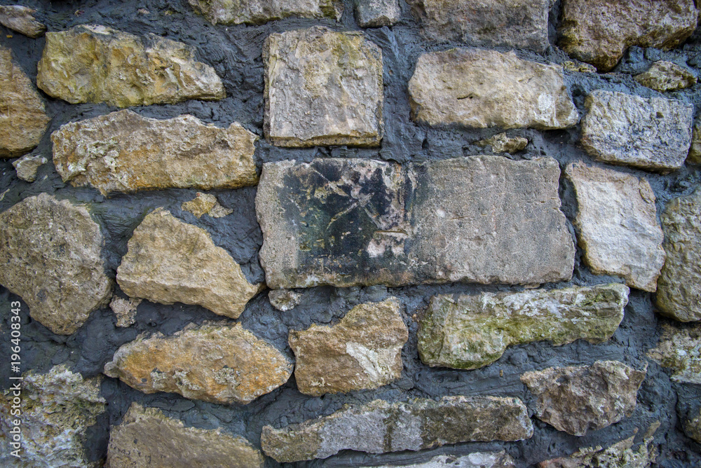 Large bricks wall. Ancient wall texture. Old grunge walls Large bricks wall. Ancient wall texture. Old grunge walls
