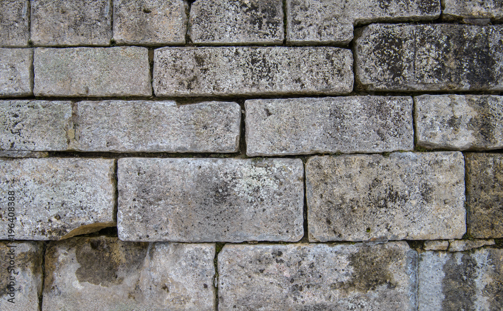 Large bricks wall. Ancient wall texture. Old grunge walls Large bricks wall. Ancient wall texture. Old grunge walls