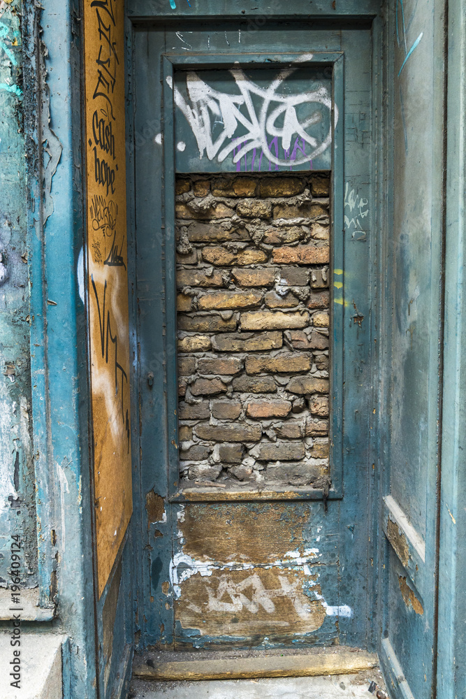 Naklejka premium Belgrade, Serbia March 12, 2018: Bricked Up Doorway in the center of Belgrade in Svetogorska Street.