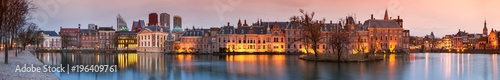 City Landscape, sunset panorama - view on pond Hofvijver and complex of buildings Binnenhof in from the city centre of The Hague, The Netherlands. photo