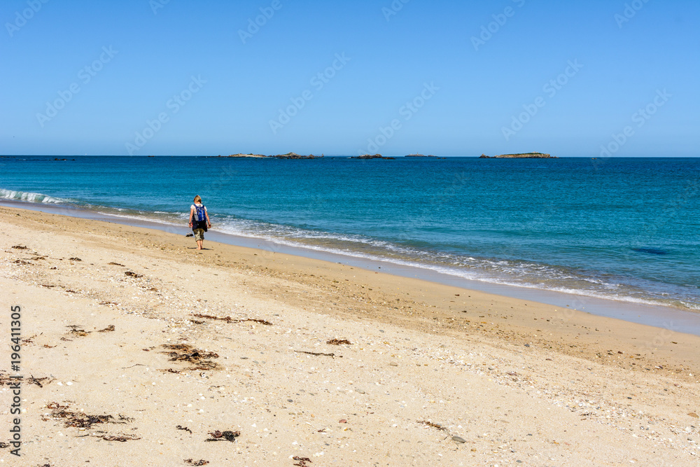 woman at shell beach herm