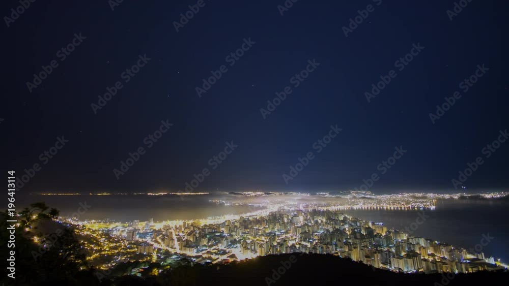Time lapse - Panoramic view of Florianópolis uptown. Beautiful night with stars and fog. Florianópolis, Santa Catarina / Brazil Time lapse - Panoramic view of Florianópolis uptown. Beautiful night with stars and fog. Florianópolis, Santa Catarina / Brazil